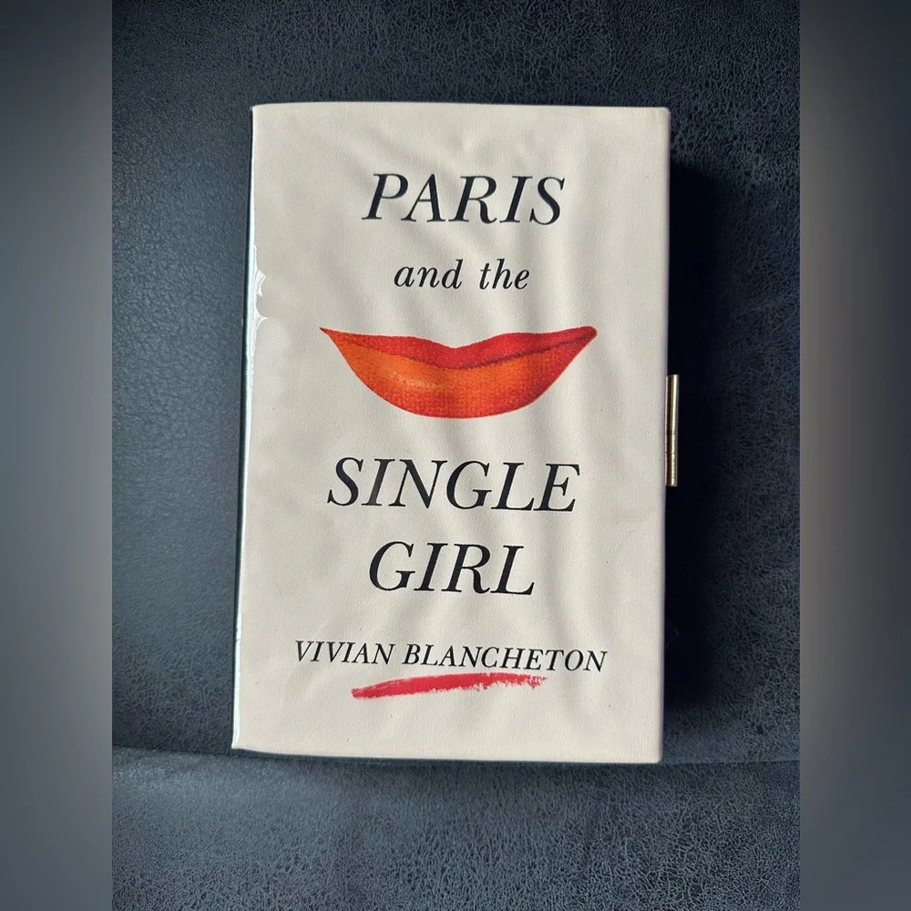Kate spade paris and the single girl book clutch